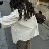 Chemise à manches longues en toile rayée