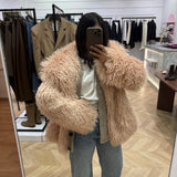 Manteau fourrure mongolienne rose