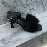 Black feather heels