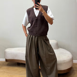 Brown sleeveless vest