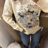 Pull brodé bleue