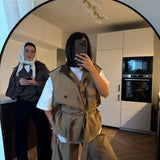 Veste sans manche à ceinture