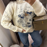 Pull brodé bleue