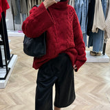 Pull en maille rouge